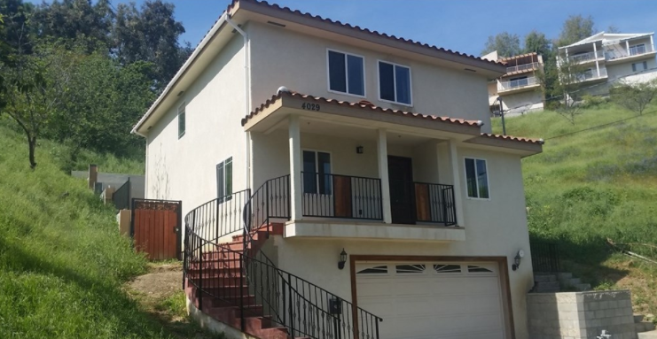This newer Mediterranean style home was built in 2009 and is located in the sought after neighborhood of Montecito Heights in a very private setting surrounded by open land.