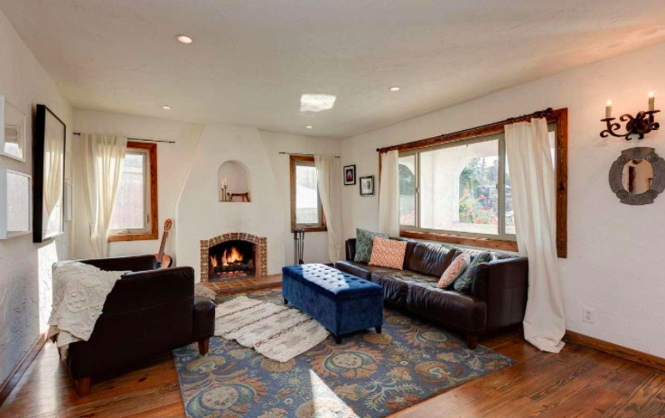 This lovely 2 bedroom + 1 bathroom Spanish style home is nestled in the foothills of Highland Park